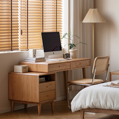 組合實木書桌,左下方連櫃桶,前方可配置藤織椅子